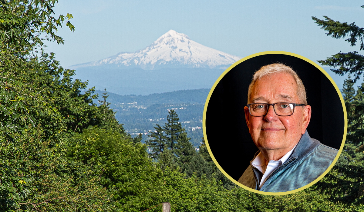 A round cutout headshot of Tommy Keown sits over a photo of Mt Hood through a break in the trees