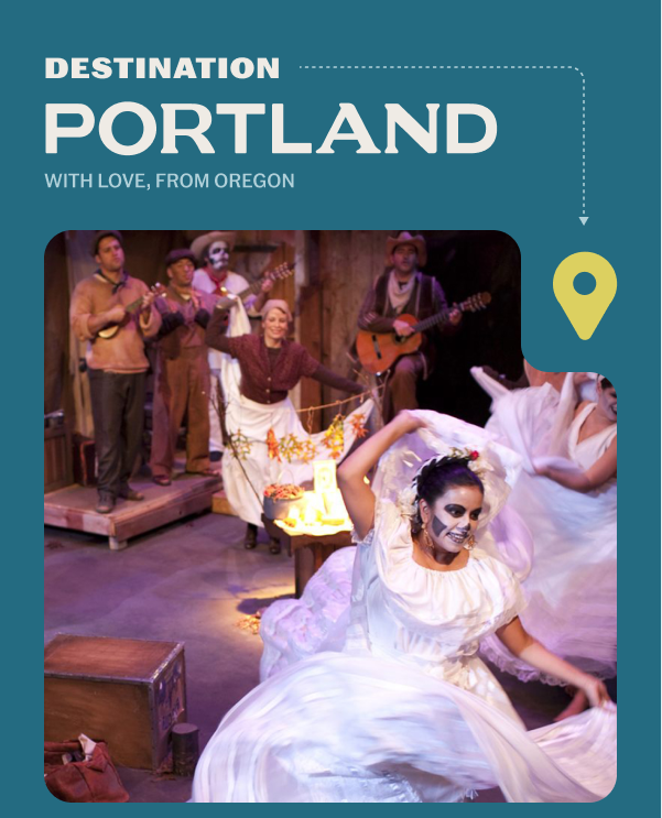 Actors dancing across a stage in long white dresses and skeleton makeup