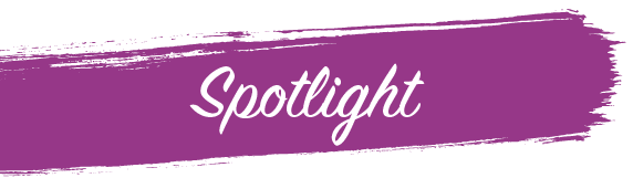 Stylized text reading 'Spotlight' on a purple brushstroke background.